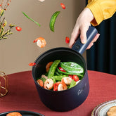 Dark blue multi-functional mini non-stick cooker with vegetables and shrimp for quick cooking